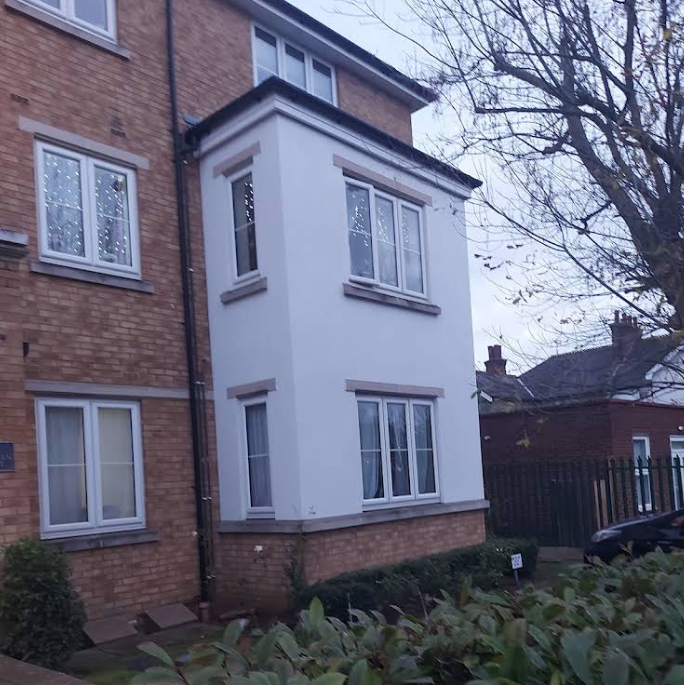 Two-storey home extension on brick property in residential area